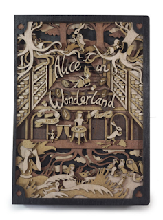 https://www.etsy.com/uk/listing/464523027/alice-in-wonderland-looking-glass-tome?ref=shop_home_feat_1