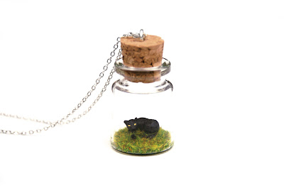 https://www.etsy.com/uk/listing/474436816/black-panther-necklace-animal-wildlife?ref=shop_home_active_44
