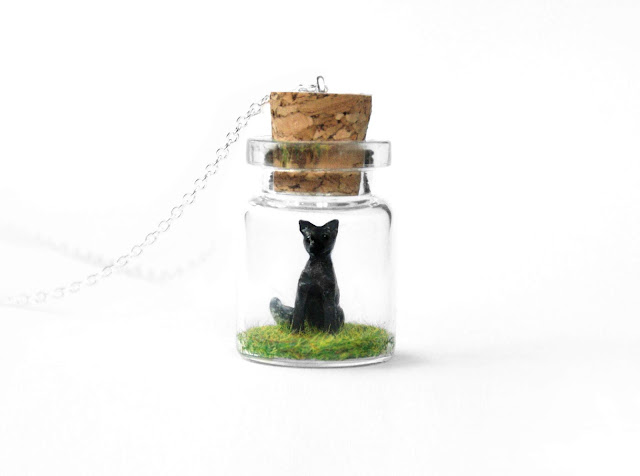 https://www.etsy.com/uk/listing/745061681/silver-fox-necklace-woodland-terrarium?ref=shop_home_active_13&pro=1