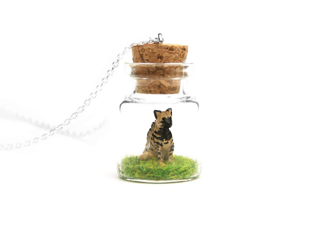https://www.etsy.com/uk/listing/741630251/striped-hyena-miniature-necklace?ref=shop_home_active_11&frs=1